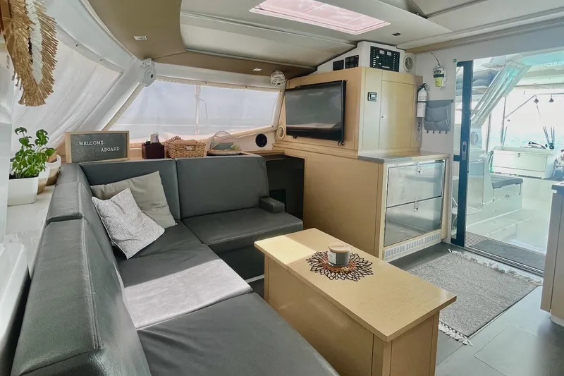 Slide: The Image of Luxurious 2015 Fountaine Pajot Helia Maestro yacht interior with cozy seating and modern amenities. - 10