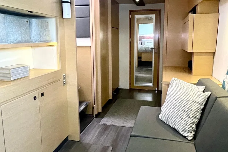 Slide: The Image of Luxurious interior of 2015 Fountaine Pajot Helia Maestro catamaran with modern furnishings. - 13