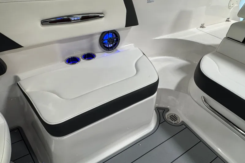 Slide: The Image of Interior of 2025 Chaparral 247 SSX boat with seating and cup holders. - 10