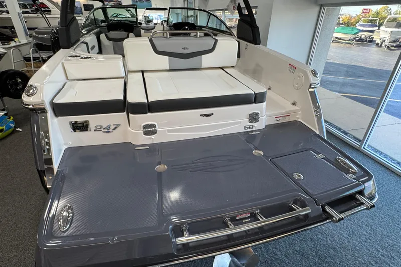 Slide: The Image of 2025 Chaparral 247 SSX boat interior with sleek seating and swim platform. - 4