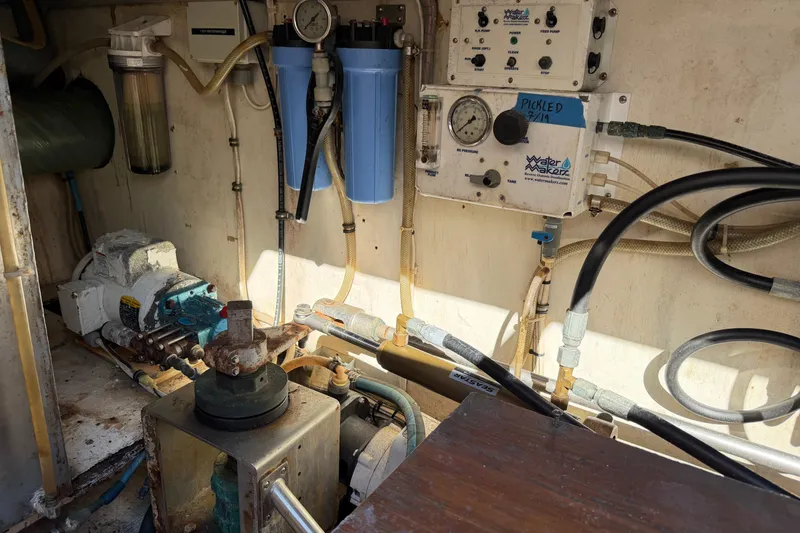 Slide: The Image of Engine room of a 1987 Hi-Star 55 Yacht Fisherman with water filtration system. - 21