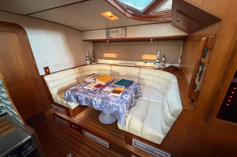 Slide: The Image of Interior of 1987 Hi-Star 55 Yacht Fisherman with cozy seating and nautical decor. - 30