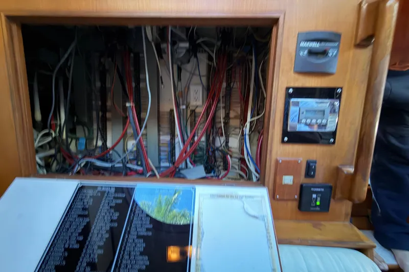 Slide: The Image of Electrical panel of 1987 Hi-Star 55 Yacht Fisherman with wiring and control systems. - 32