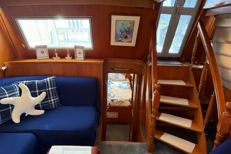 Slide: The Image of Interior of 1987 Hi-Star 55 Yacht Fisherman with cozy seating and nautical decor. - 35