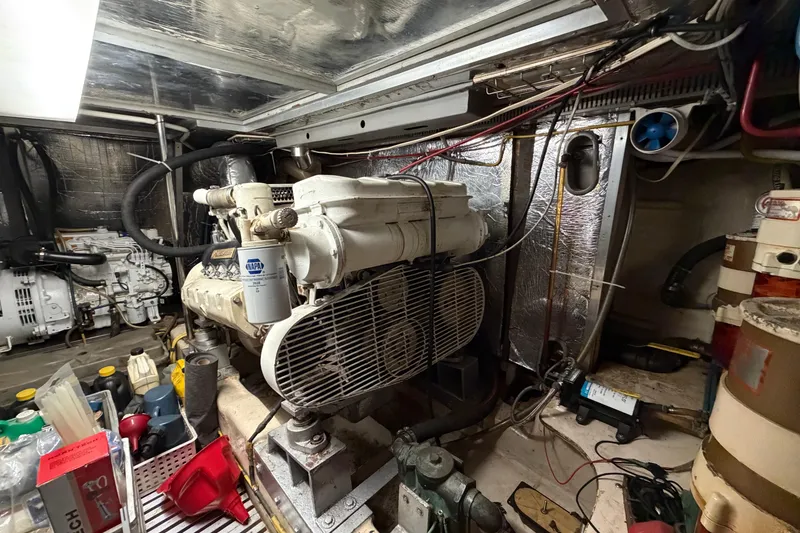 Slide: The Image of Engine room of a 1987 Hi-Star 55 Yacht Fisherman, showcasing machinery and equipment. - 55