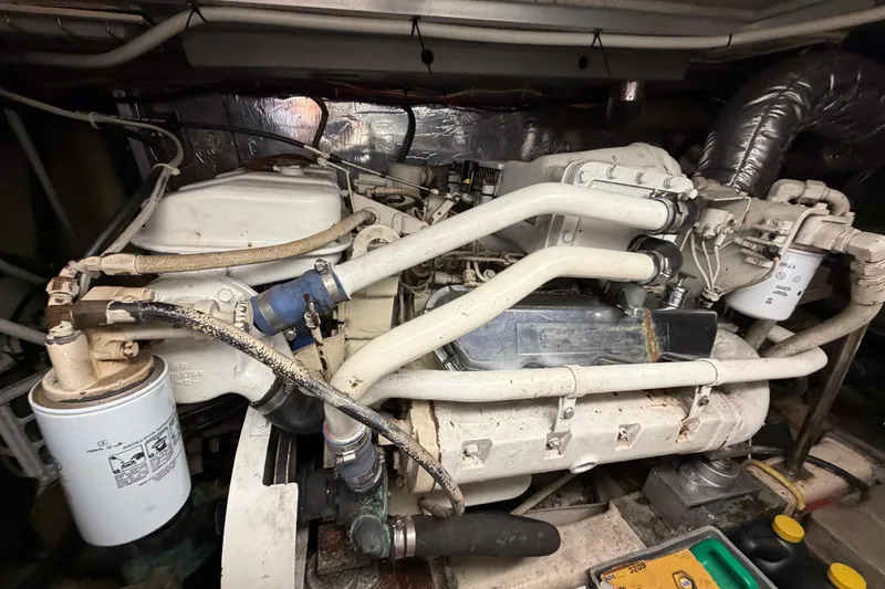 Slide: The Image of Engine room of a 1987 Hi-Star 55 Yacht Fisherman, showcasing mechanical components. - 59