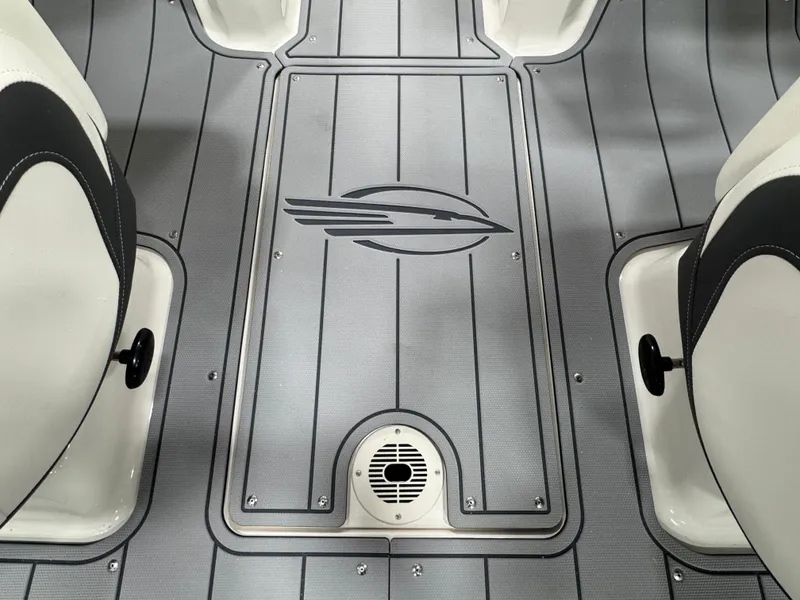 Slide: The Image of 2025 Chaparral 21 SSi boat interior with sleek gray flooring and logo design. - 18