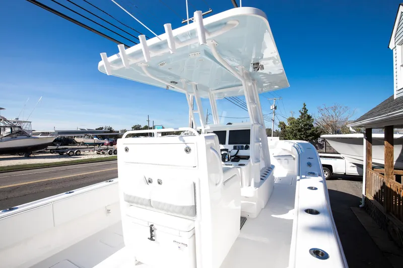 Slide: The Image of 2023 Invincible 33 Open Fisherman boat with center console and T-top. - 6