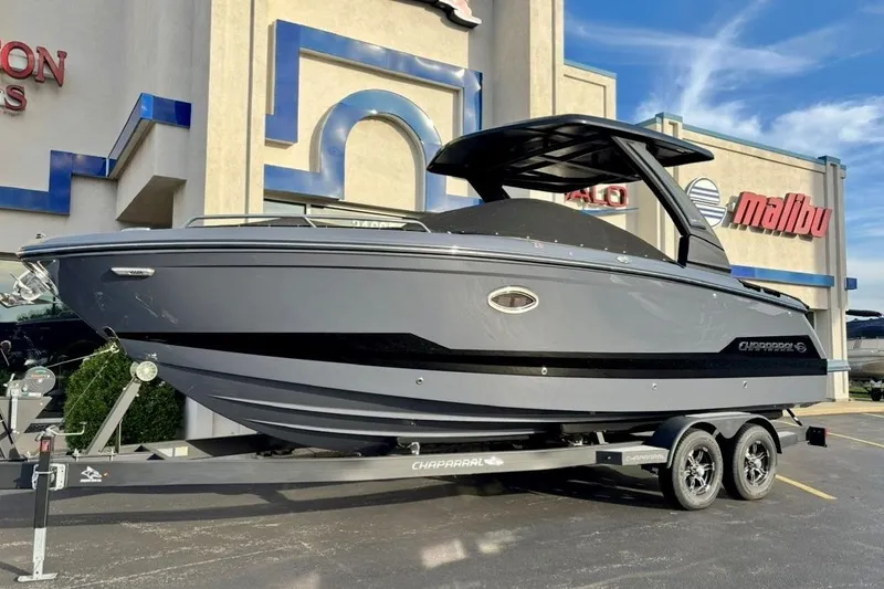 The Image of 2025 Chaparral 2870 SSX boat on trailer outside dealership. - 0