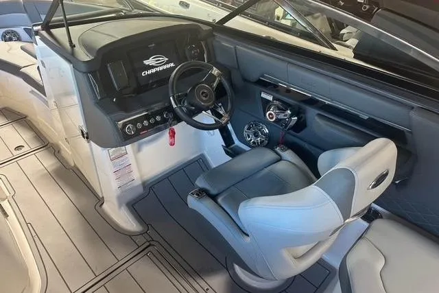 Slide: The Image of 2025 Chaparral 2870 SSX boat interior with modern helm and seating. - 4
