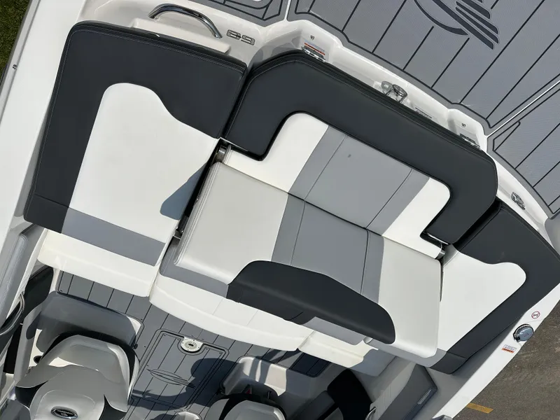 Slide: The Image of 2025 Chaparral 21 SSi boat interior with sleek, modern seating design. - 13