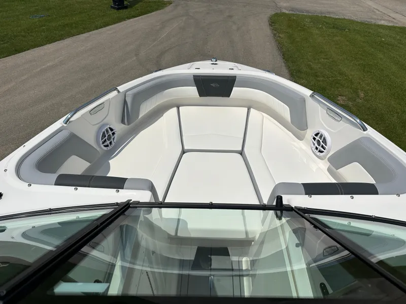 Slide: The Image of 2025 Chaparral 21 SSi boat interior with spacious seating and modern design. - 7