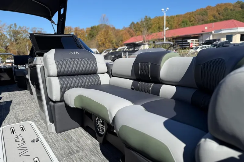 Slide: The Image of 2026 Avalon 2385 Catalina QLS Windshield boat with luxurious seating and modern design. - 18