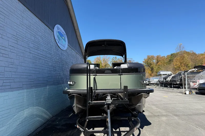 Slide: The Image of 2026 Avalon 2385 Catalina QLS Windshield pontoon boat parked outdoors. - 3
