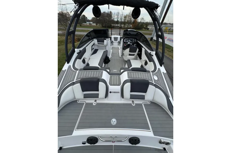 Slide: The Image of 2021 Yamaha Boats AR210 interior with sleek seating and modern design. - 6