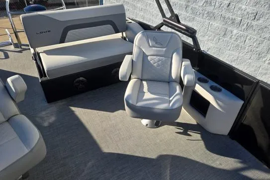 Slide: The Image of 2026 Lowe SS 230 DV boat interior with cushioned seating and modern design. - 12