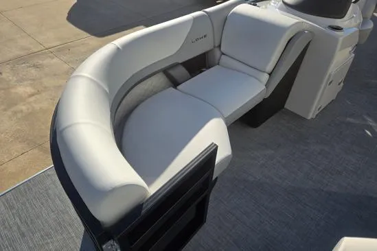 Slide: The Image of 2026 Lowe SS 230 DV boat with luxurious white seating and modern design. - 8