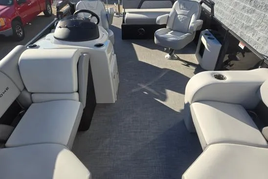 Slide: The Image of 2026 Lowe SS 230 DV boat interior with plush seating and modern helm. - 9
