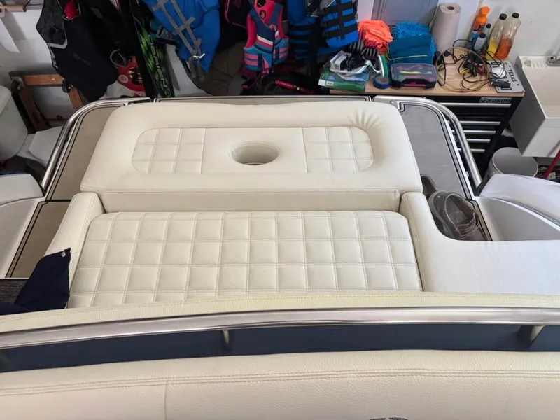 Slide: The Image of Interior of a 2021 Cobalt R3 Surf boat with white upholstery. - 4