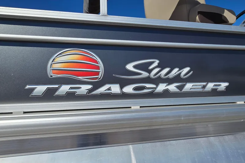 Slide: The Image of 2019 Sun Tracker Fishin' Barge 22 XP3 logo on boat exterior. - 13