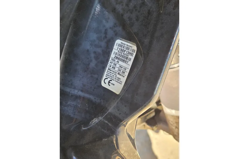 Slide: The Image of Label on 2019 Sun Tracker Fishin' Barge 22 XP3, displaying model and serial numbers. - 17