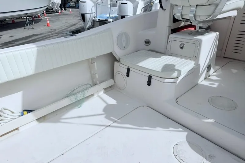 Slide: The Image of 2005 Grady-White Journey 258 boat interior with seating and storage compartments. - 31