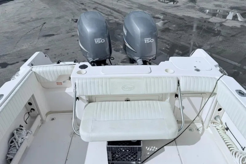 Slide: The Image of 2005 Grady-White Journey 258 boat with twin Yamaha 150 engines, rear seating view. - 32