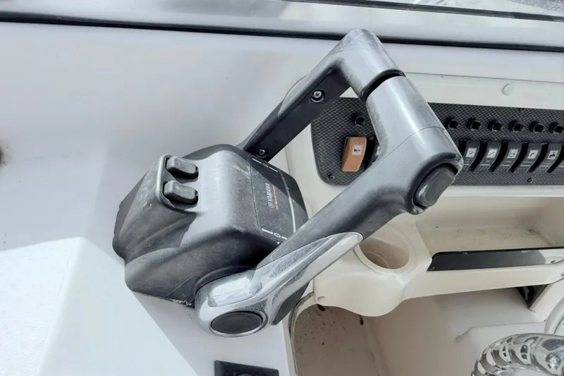 Slide: The Image of Close-up of throttle controls on a 2005 Grady-White Journey 258 boat. - 34