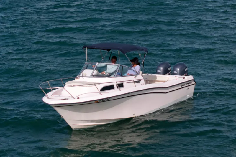 Slide: The Image of 2005 Grady-White Journey 258 boat cruising on open water. - 4