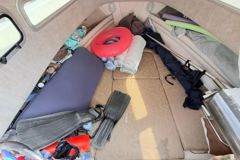 Slide: The Image of Interior of 2005 Grady-White Journey 258 boat with diving gear and accessories. - 40