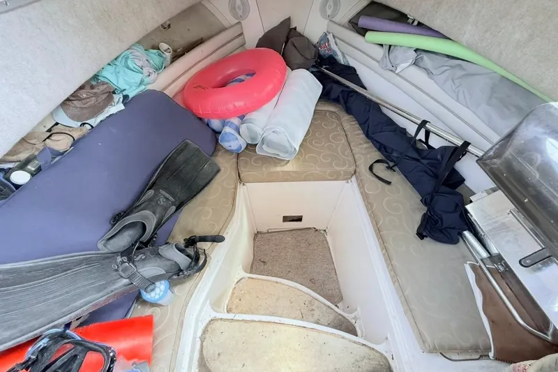 Slide: The Image of Interior of 2005 Grady-White Journey 258 boat with diving gear and accessories. - 44