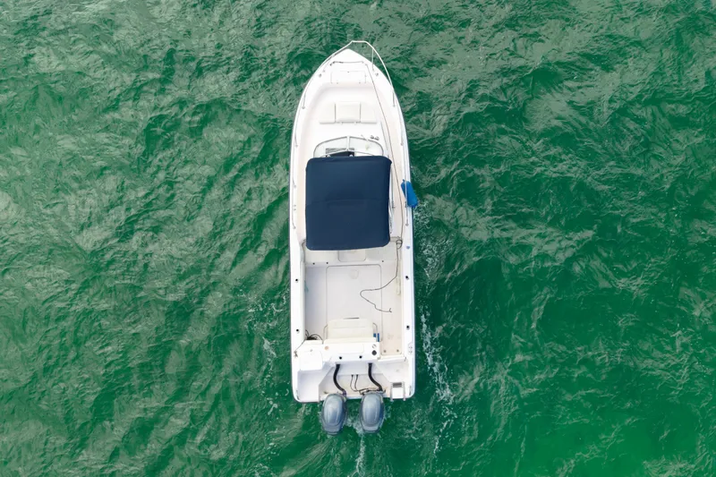 Slide: The Image of Aerial view of 2005 Grady-White Journey 258 boat on green water. - 5