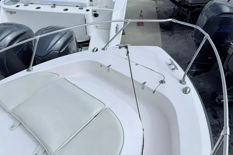 Slide: The Image of 2005 Grady-White Journey 258 boat deck with dual Yamaha engines. - 52