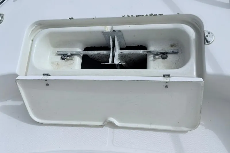 Slide: The Image of Anchor compartment of 2005 Grady-White Journey 258 boat, open and visible. - 53