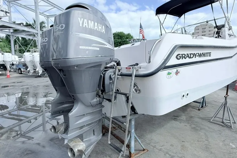 Slide: The Image of 2005 Grady-White Journey 258 boat with Yamaha outboard motor on display. - 56