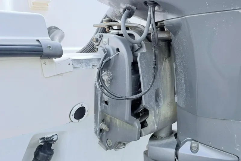 Slide: The Image of 2005 Grady-White Journey 258 boat engine close-up, showing mechanical details and connections. - 60