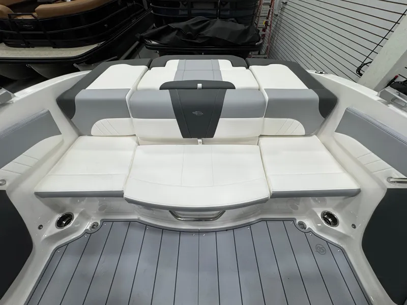 Slide: The Image of 2025 Chaparral 21 SSi boat interior with sleek, modern seating and stylish design. - 11