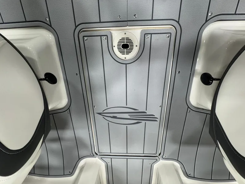 Slide: The Image of 2025 Chaparral 21 SSi boat interior with sleek gray flooring and stylish design. - 20