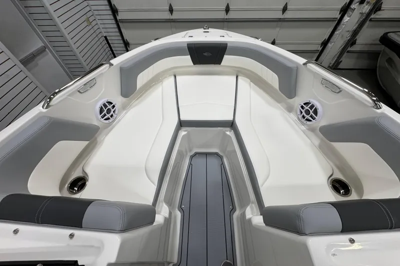 Slide: The Image of 2025 Chaparral 21 SSi boat interior, featuring sleek design and modern seating arrangement. - 22
