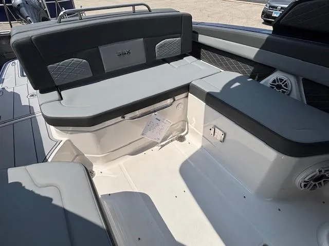 Slide: The Image of 2026 Chaparral SSX 6 boat interior with gray seating and modern design. - 17
