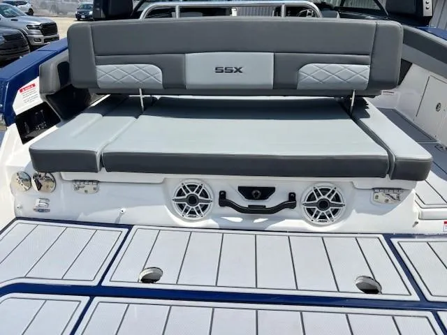 Slide: The Image of 2026 Chaparral SSX 6 boat with gray seating and integrated speakers. - 19