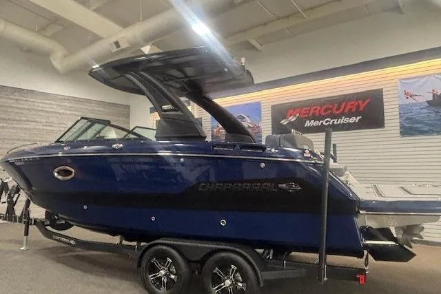 Slide: The Image of 2026 Chaparral 6 SSX boat displayed indoors, featuring sleek design and modern features. - 4