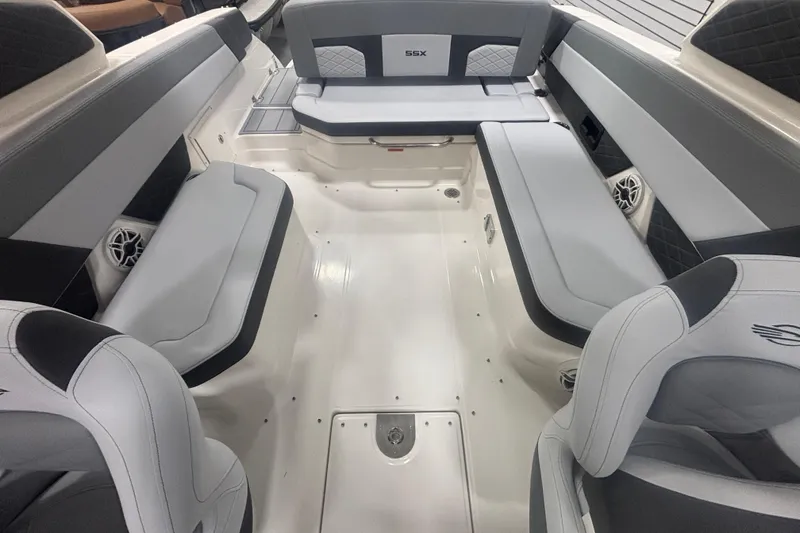 Slide: The Image of 2026 Chaparral 8 SSX boat interior with luxurious seating and modern design. - 13