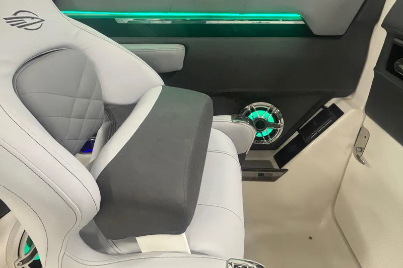 Slide: The Image of 2026 Chaparral 8 SSX interior with modern seating and illuminated speaker. - 15
