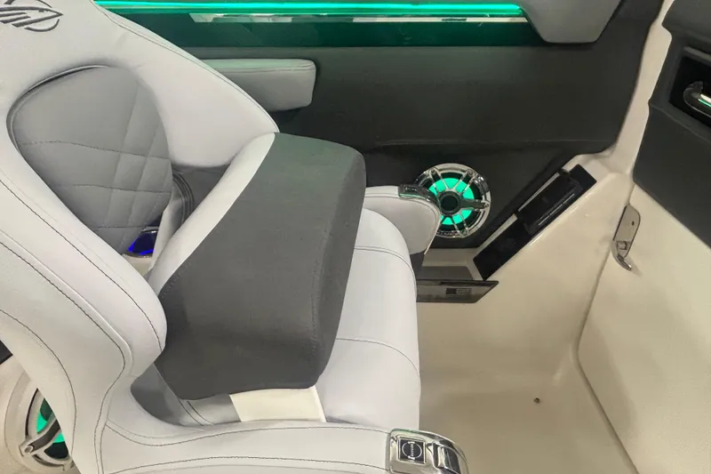 Slide: The Image of Luxurious interior of 2026 Chaparral 8 SSX boat with modern seating and ambient lighting. - 28