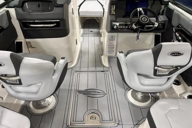 Slide: The Image of 2026 Chaparral 8 SSX boat interior with modern seating and sleek dashboard design. - 6