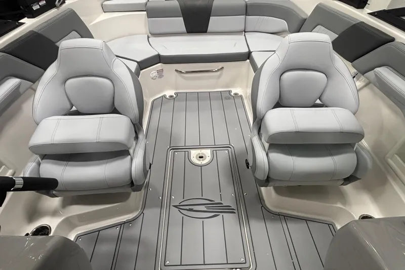 Slide: The Image of 2026 Chaparral 23 SSi boat interior with gray seating and sleek design. - 21