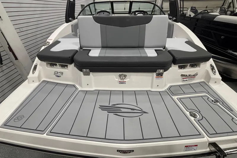 Slide: The Image of 2026 Chaparral 23 SSi boat with sleek gray seating and deck design. - 28