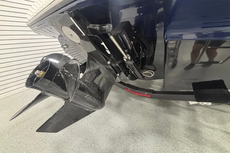 Slide: The Image of 2026 Chaparral 23 SSi boat stern drive and propeller in showroom. - 30