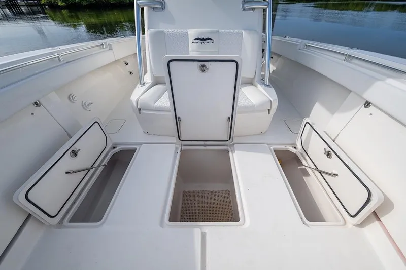 Slide: The Image of 2016 Invincible 39 Open Fisherman boat interior with open storage compartments. - 9